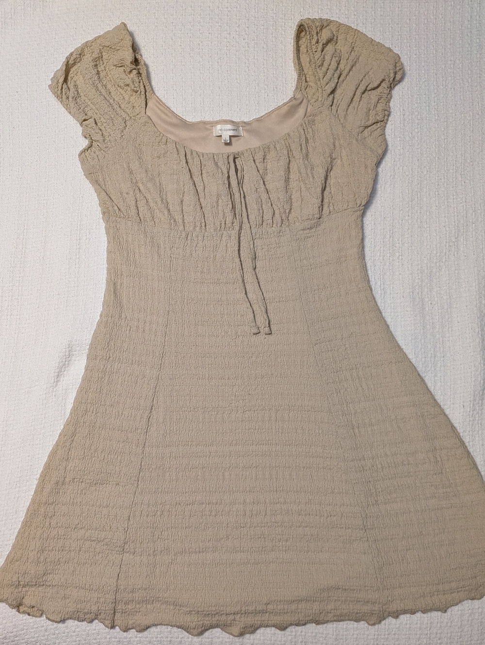 No Comment Cream Smocked Mini Dress with Tie Neck